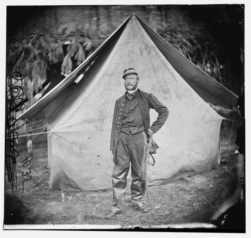 François Victor Adolphe de Chanal standing in front of a tent