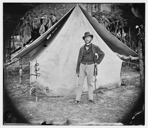 François Victor Adolphe de Chanal standing in front of a tent