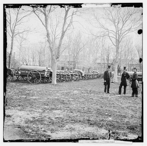 Washington, District of Columbia. Wiard gun at U.S. Arsenal. (L to R: Gen. Daniel Sickles, N.P. Willis, H.L. Stuart)