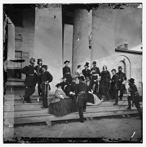Arlington, Virginia (vicinity). Gen. Samuel P. Heintzelman and staff at Arlington house. (Mathew B. Brady, the photographer is shown in a top hat)