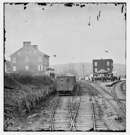 Hanover Junction, Pennsylvania. View of railroad station and boxcars