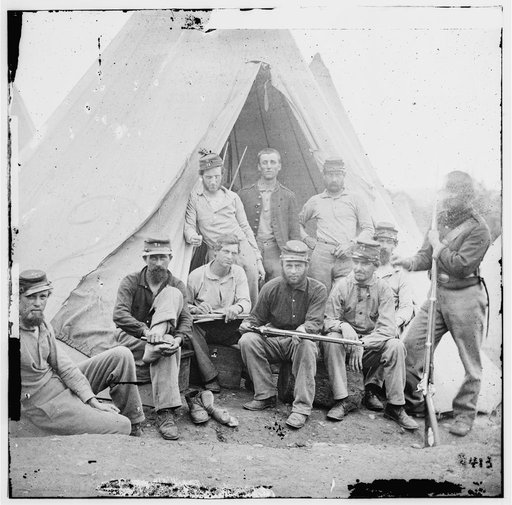 Group of soldiers of Company G, 71st New York Vols. In front of 'Sibley" tent