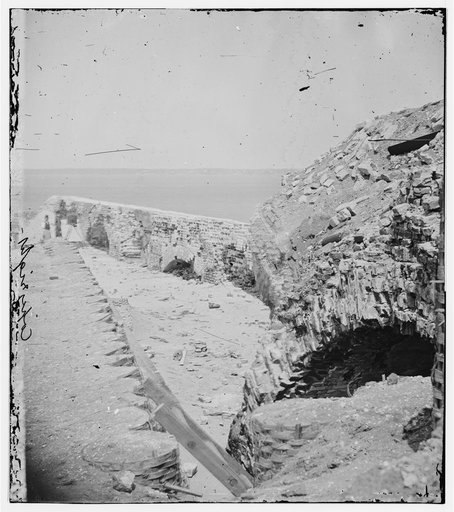 Charleston, South Carolina. Samuel Cooley, photographer with his camera on the battered parapet of Fort Sumter