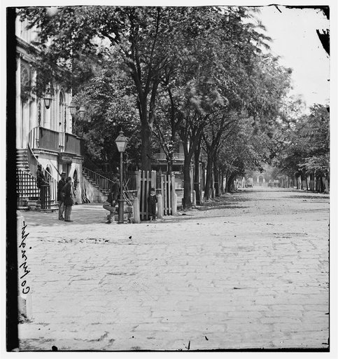 Charleston, South Carolina. View looking east from the corner of Meeting Street & Broad Street. City Hall in the foreground used as a Provost Guard House