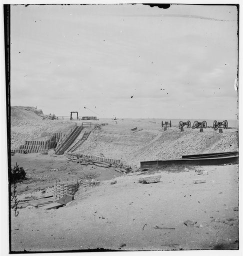Charleston, South Carolina. Interior view of Fort Sumter on the occasion of the raising of the old flag. (Four field guns on parapet)