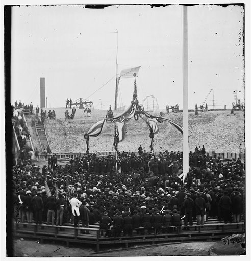 Charleston, South Carolina. Flag-raising ceremony at Fort Sumter. (Generals Robert Anderson and Quincy A. Gillmore near the center of the photo preparing to raise the flag.)