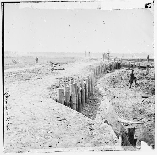 Petersburg, Virginia. Confederate breastworks in front of Petersburg. (The small mounds with chimneys are soldier's quarters under ground)