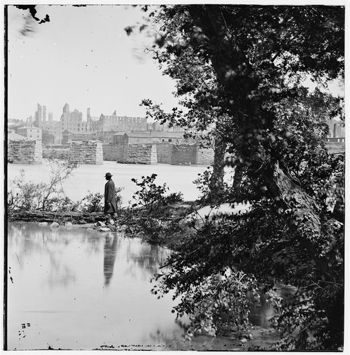 Richmond, Virginia. View of burned district and ruins of Mayo's bridge from across the James River