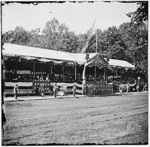 Washington, District of Columbia. The grand review of the Army. Presidential reviewing stand with guests and guard