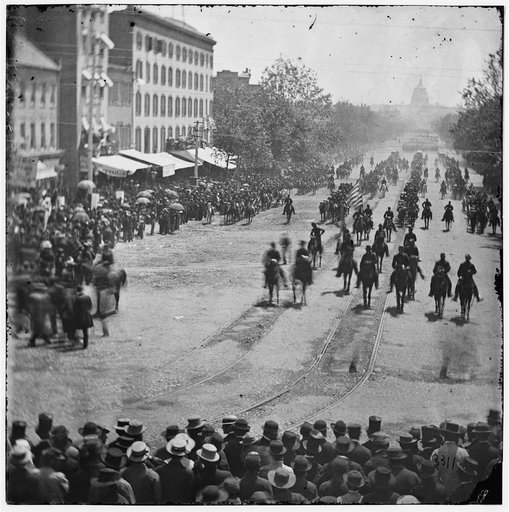 Washington, District of Columbia. The Grand Review of the Army. Artillery unit passing on Pennsylvania Avenue near the Treasury