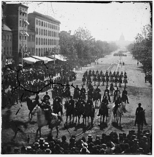 Washington, District of Columbia. The Grand Review of the Army. [Cavalry?] passing on Pennsylvania Avenue near the Treasury
