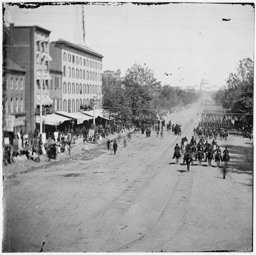 Washington, District of Columbia. Infantry passing on Pennsylvania Avenue near the Treasury