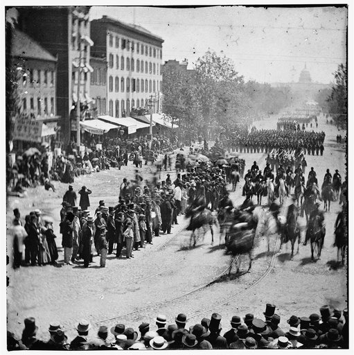 Washington, District of Columbia. The Grand Review of the Army. Gen. Henry W. Slocum (Army of Georgia) and staff passing on Pennsylvania Avenue near the Treasury
