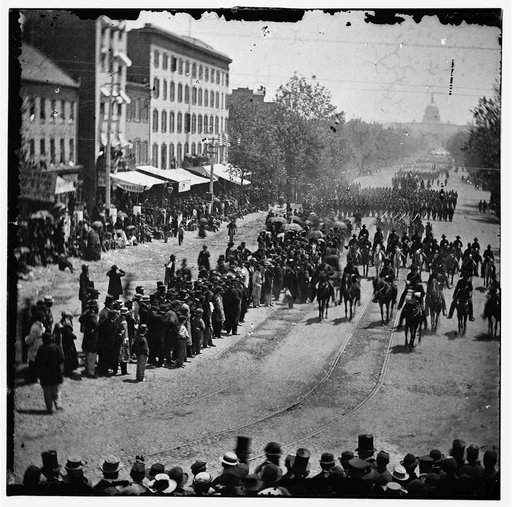 Washington, District of Columbia. The Grand Review of the Army. Gen. Henry W. Slocum (Army of Georgia) and staff passing on Pennsylvania Avenue near the Treasury