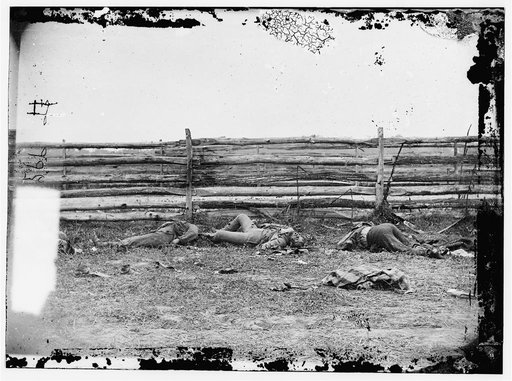 Antietam, Maryland. Bodies of Confederate soldiers by fence on Hagerstown pike