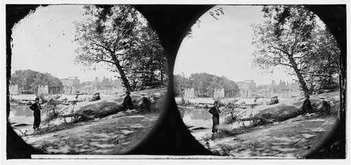Richmond, Virginia. Ruins of Richmond & Danville Railroad bridge: the city beyond