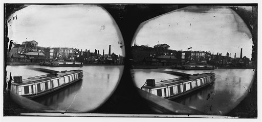 Richmond, Virginia. Canal basin. (Burnt district and Capitol building in background)