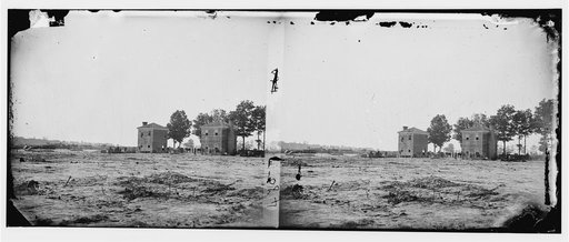 Fair Oaks, Virginia. Rear view of old frame house, orchard, and well at Seven Pines. Over 400 soldiers were buried here after the battle of Fair Oaks