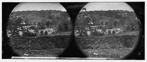 North Anna River, Virginia. View of log bridge at Quarles mill from south side. Camp of general headquarters in the distance
