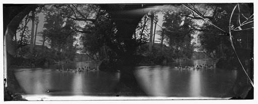 North Anna River, Virginia. Soldiers bathing. Ruins of Richmond & Fredericksburg railroad bridge in the distance
