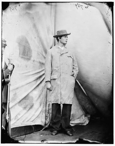Washington Navy Yard, District of Columbia. Lewis Payne, the conspirator who attacked Secretary Seward, standing in overcoat and hat