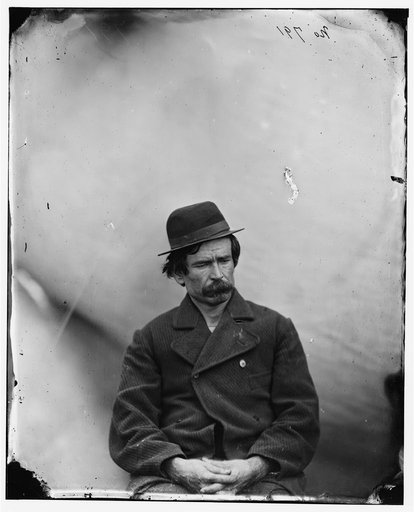 Washington Navy Yard, District of Columbia. Man arrested on suspicion of being one of the conspirators. Name not disclosed