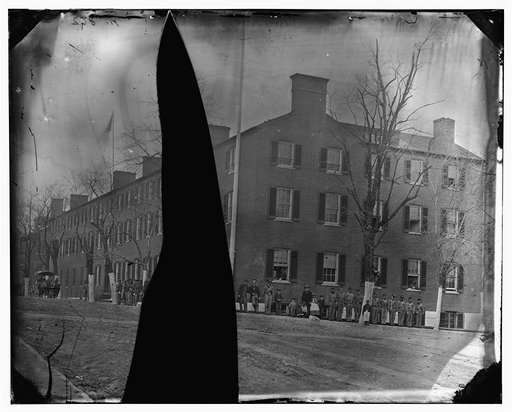 Washington, District of Columbia]. Group in front of building