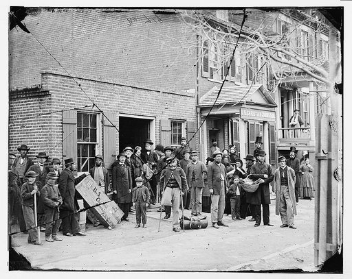 Washington, District of Columbia. Maimed soldiers and others before office of U.S. Christian Commission