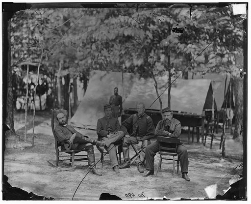 Petersburg, Virginia. Officers of 1st Massachusetts Cavalry at Army of the Potomac headquarters: unknown, Capt. Edward A. Flint, Capt. Charles Francis Adams, Jr., Lt. George H. Teague