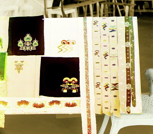 Display of embroidered cloth and woven sashes