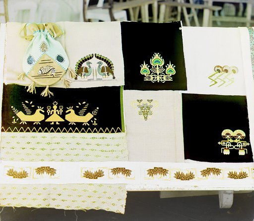 Display of embroidered cloth and pouch