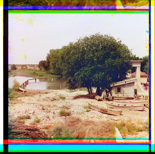 Waterfront scene including bridges, boats and buildings