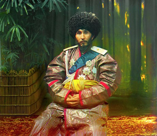 Isfandiyar, Khan of the Russian protectorate of Khorezm (Khiva), in uniform, seated on chair, outdoors