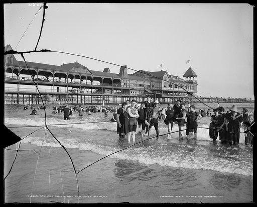 Bathers and the iron pier, Coney Island, N.Y.