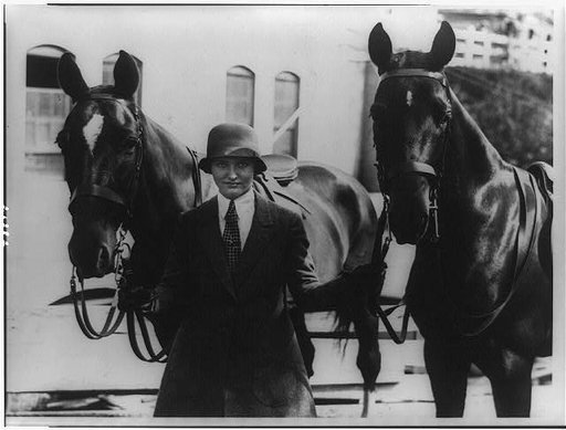 Annual Washington horse show opens at the riding and hunt club- Mary Parker Corning, daughter of Parker Corning, congressman from New York, with her two entries "Joy" and "Red"