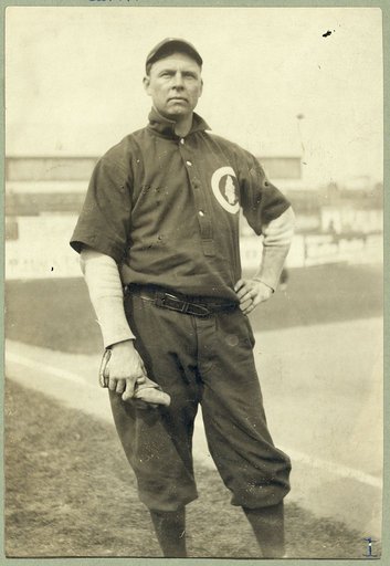Mordecai Peter Centennial Brown, (Three Finger Brown), baseball player for Chicago National League, posed, standing, on baseball field