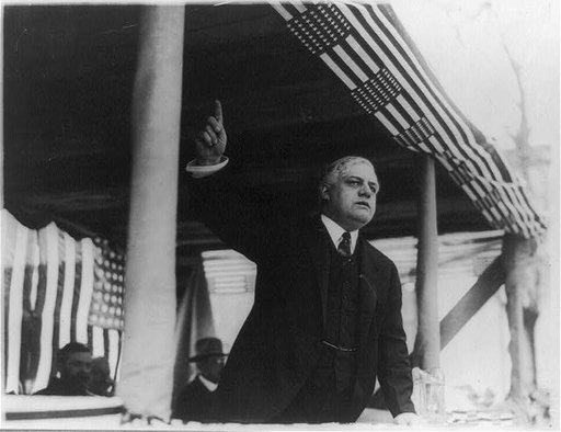 Alexander Mitchell Palmer, half-length portrait, standing, facing slightly right, making a speech