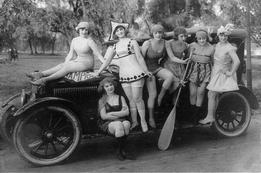 Mack Sennett's bathing beauties posed on automobile, Washington, D.C., area