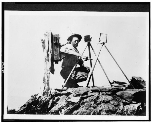 Signal station in the Rockies, showing telephone installation and signal man using heliograph