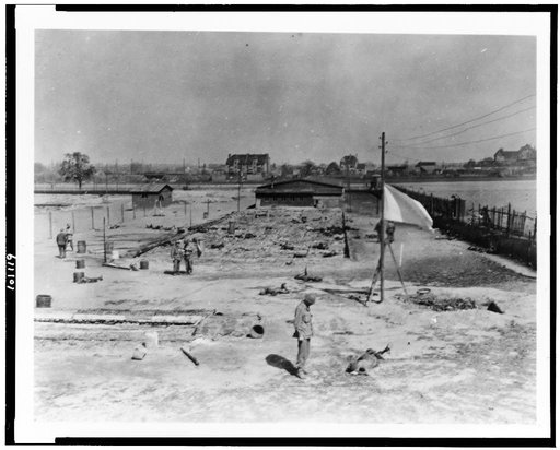 Site of mass burning of 250 Polish and French slave laborers at Nazi camp near Leipzig on April 19, 1945, the day before the city was captured by 69th Inf. Div. First U.S. Army. The victims were herded into a building. A time bomb was exploded. Men who broke doors down to escape, were machine gunned