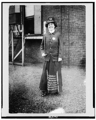 Suffragist posed in police uniform to illustrate woman police concept, Cincinnati, Ohio