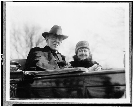 President Woodrow Wilson, half-length portrait, facing right, in automobile, with his second wife