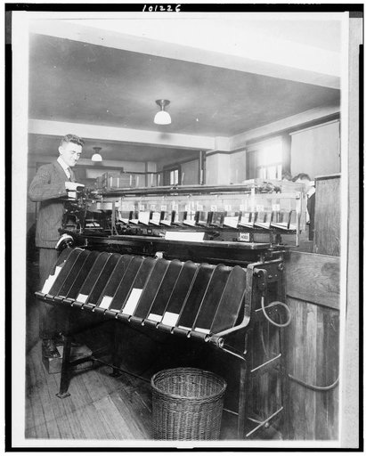 An Automatic sorting machine in use in the Census Office. ...