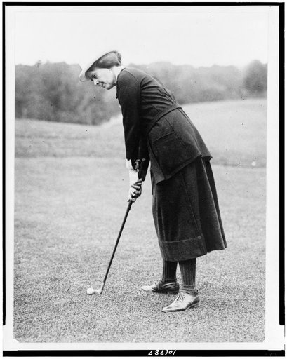 Miss Elsie Patterson, full-length portrait, standing, facing left, ready to hit golf ball, Washington, D.C., area(?)
