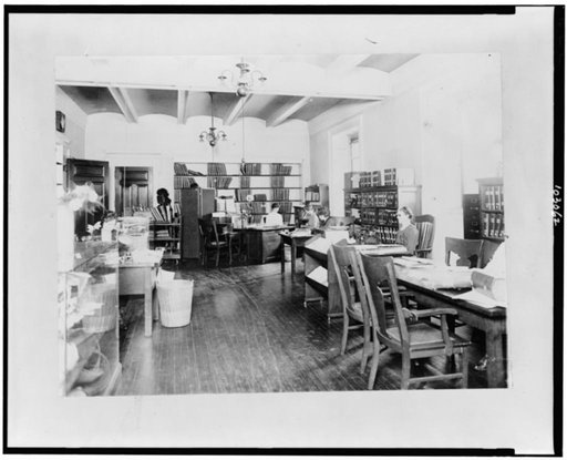 Reading room for the blind in the Library of Congress, where books and magazines in braille or moon type are always on hand. Several employees of this division are blind