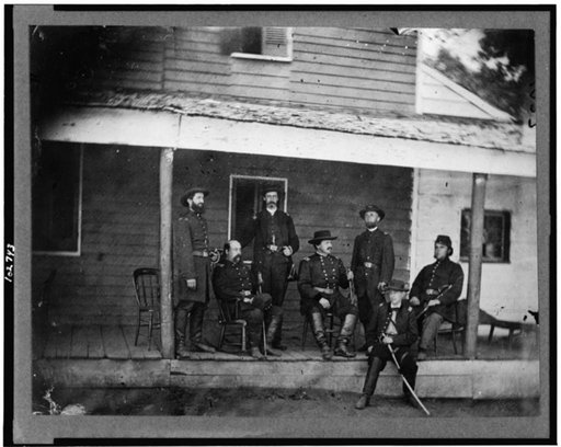 Gen. Alexander McCook and staff posed on porch near Washington, D.C.