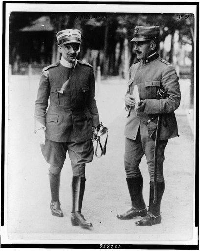 Gabriele D'Annunzio, full-length portrait, standing, facing slightly right, with another officer