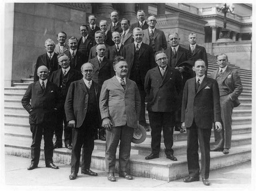 Twenty-three members of the U.S. House of Representatives who are members of Rotary Clubs posed on steps of the U.S. Capitol after having their rotary luncheon