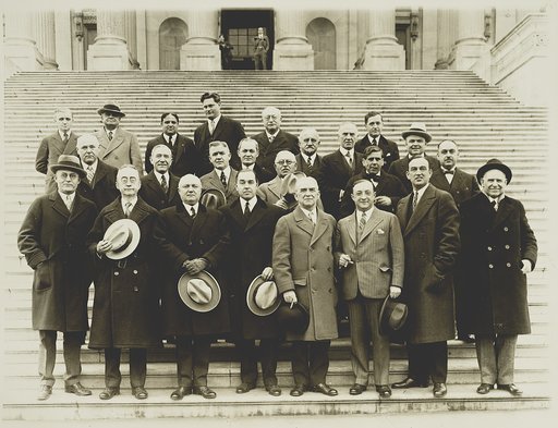 Wet block in Congress meets to plan for wet legislation. Rep. John Phillip Hill, chairman of the wet block (in the center) and some of the 61 wet members snapped after the meeting