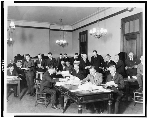 Committee on Elections of the Senate engaged in the counting of the Ford-Newberry vote. Tellers in the foreground of the picture are Senators Walter E. Edge of N.J. and Selden P. Spencer of Mo.